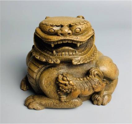 Lion bamboo carving